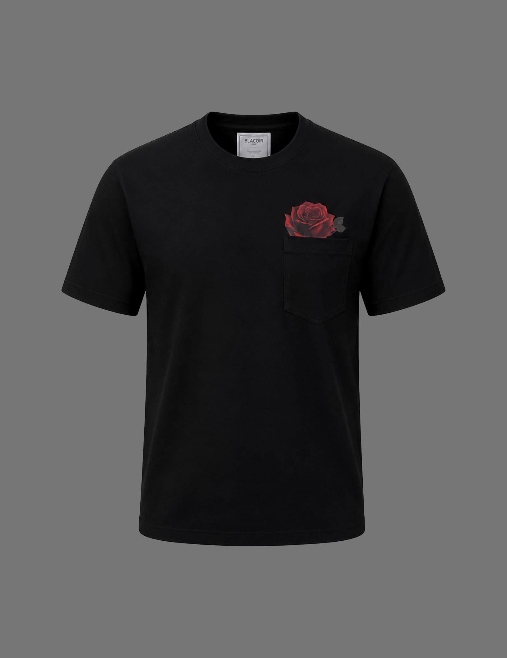 Premium black BLACOIR Rosemark Pocket Tee featuring a red rose graphic emerging from a chest pocket, crew neckline, short sleeves, and minimalist luxury styling on a neutral grey background.